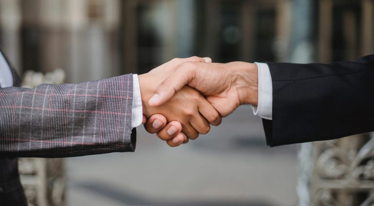A handshake between two business partners.